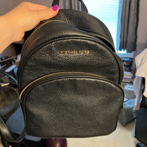 Authentic Michael kors black leather backpack purse